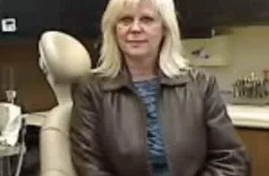 Jill, a patient of Bjorklund Dental Designs, in the practice's own treatment room.