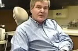 Tom, an implant patient, in the practice's own treatment room.