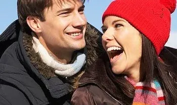 A young couple laughing, from the practice's own page on eating disorder treatment.